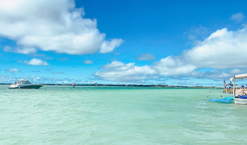 two boats anchored at the islamorada sandbar